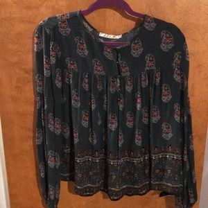 Women’s long sleeved button up shirt